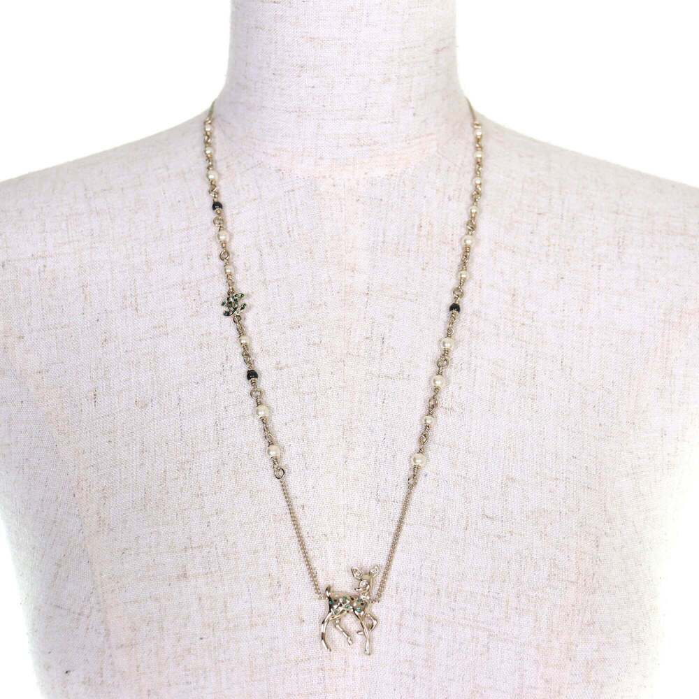 CHANEL Gold Pearl Logo Necklace - Picture 3 of 8